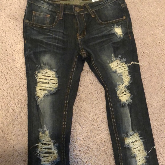 Ripped blue jeans - Picture 3 of 3